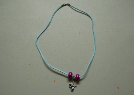 Purple Necklace with Purple and Rattie Charms
